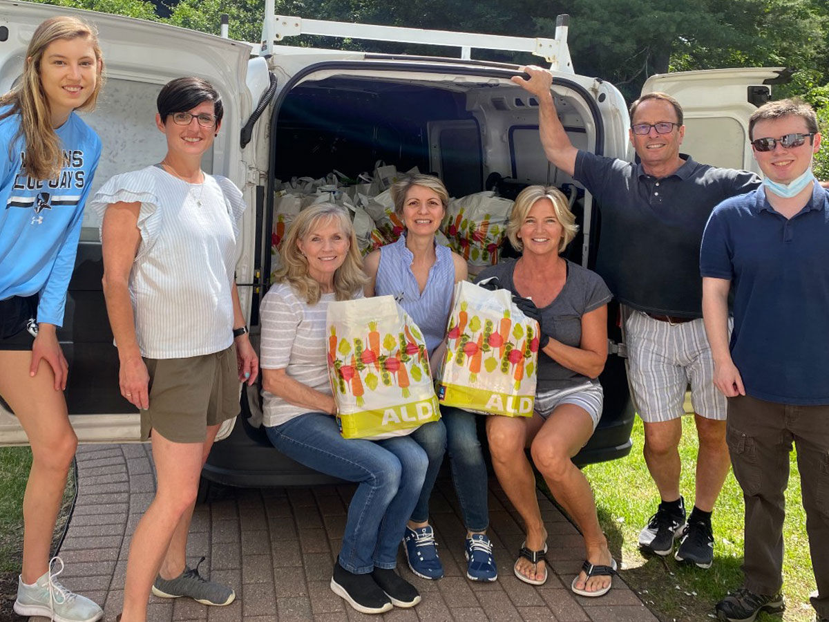 volunteers with food